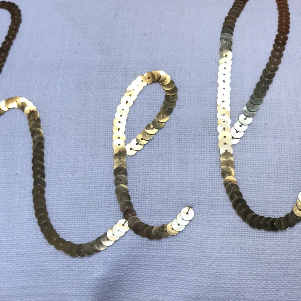 Indaba Trading 100% cotton decorative Throw Pillow Hello in gold sequins